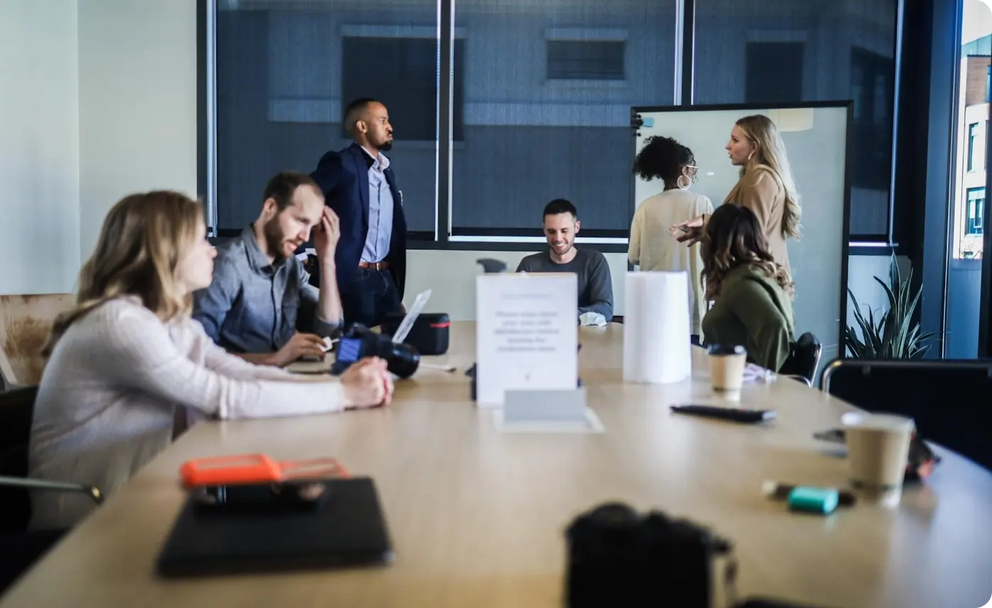 a group of people around a table